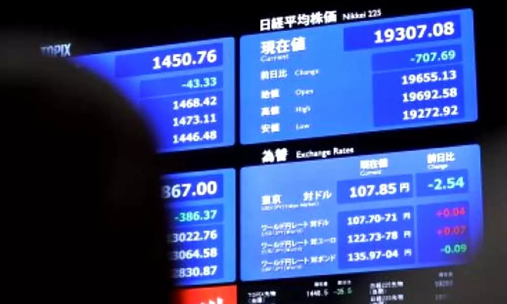 Tokyo stocks close higher on buying in tech shares