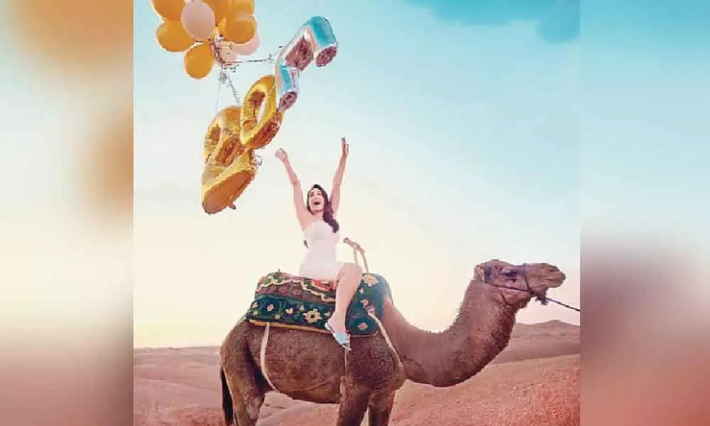 Nora Fatehi rides camel to celebrate 20 mn Instagram followers