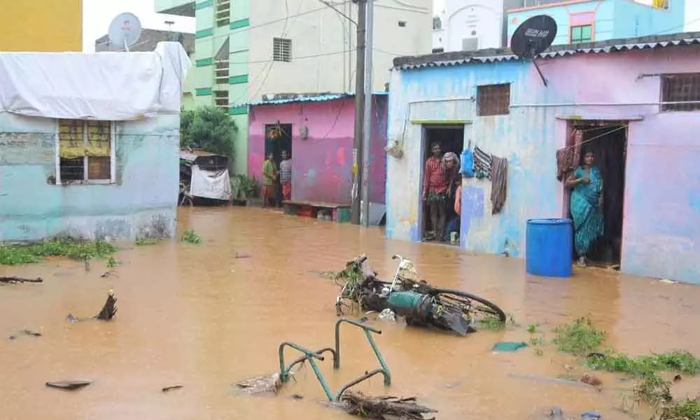 Flooded houses in Nagarajapet in Kadapa city on Friday