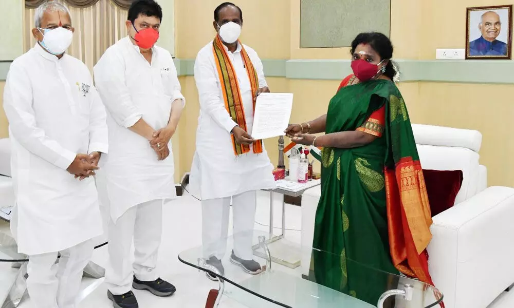 BJP leaders Dr Laxman, Ramchandra Rao and Chintala Ramchandra Reddy submitting a representation to Governor Dr Tamilisai Soundararajan