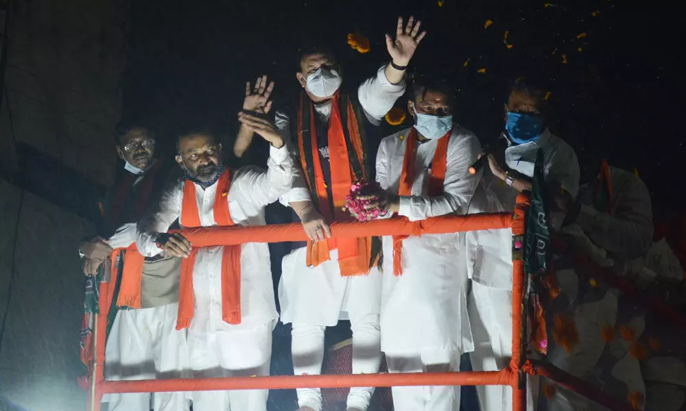 BJP national president J P Nadda participating in a BJP roadshow for GHMC polls at Kothapet in Hyderabad on Friday