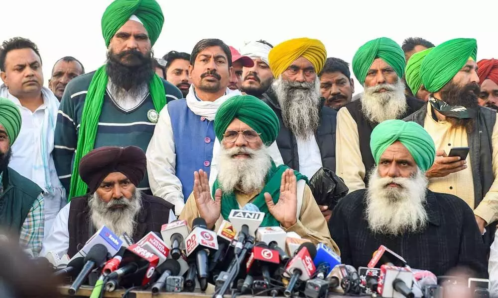 Leaders of various farmer unions address the media at Singhu border in New Delhi on Sunday