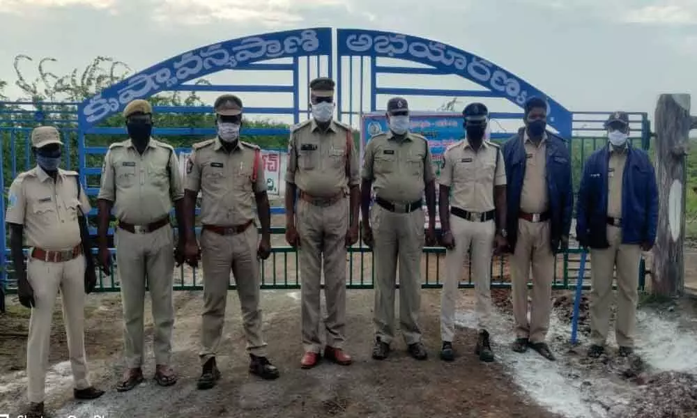Koduru police standing vigil the Palakayatippa Karakatta check-post in Krishna district on Sunday