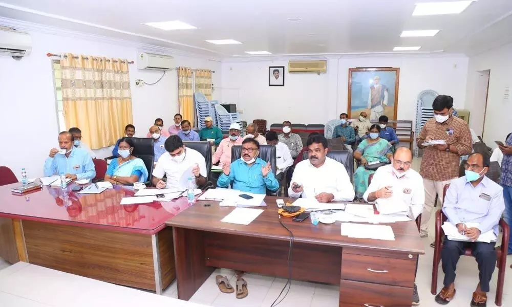 Prakasam District Collector Dr Pola Bhaskara speaking to the ground level officials from Collectorate in Ongole on Monday