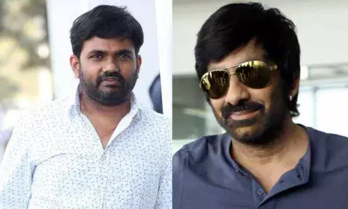 Director Maruthi and Ravi Teja