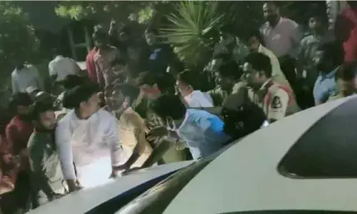 Bandi Sanjays follower car attacked by mob