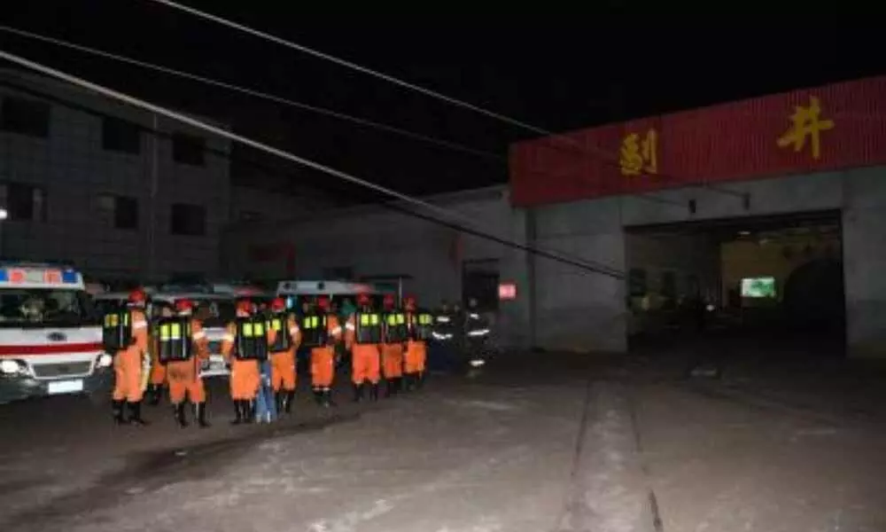 Rescue underway for 13 trapped Chinese coal miners