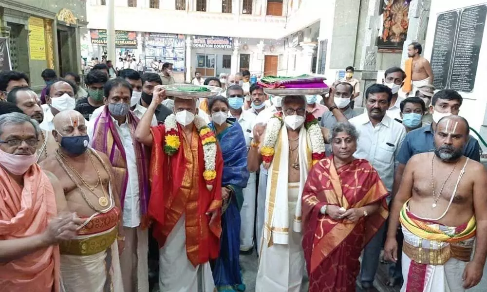 TTD chairman YV Subba Reddy and Additional  EO A V Dharma Reddy carrying silk clothes to Mantralayam temple on Tuesday