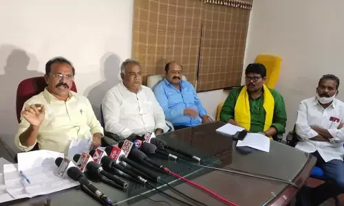Ongole parliamentary division TDP president Dr Nukasani Balaji addressing a press meet in Ongole on Wednesday