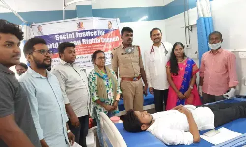 Youth donating blood at KS Care Hospital in Kurnool town on Wednesday.