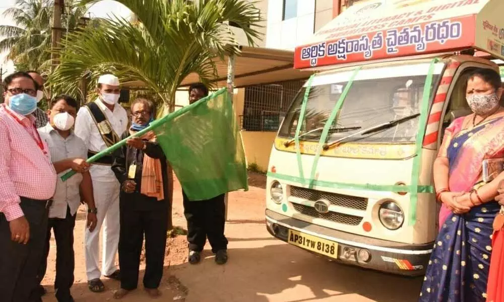 Joint Collector K Srinivasulu flagging off a mobile van on financial literacy and digital banking, in Srikakulam on Thursday