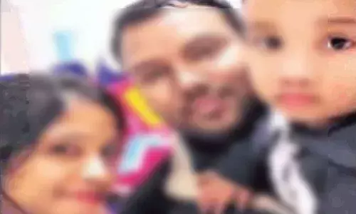 Panuganti Sridhar along with his wife and son