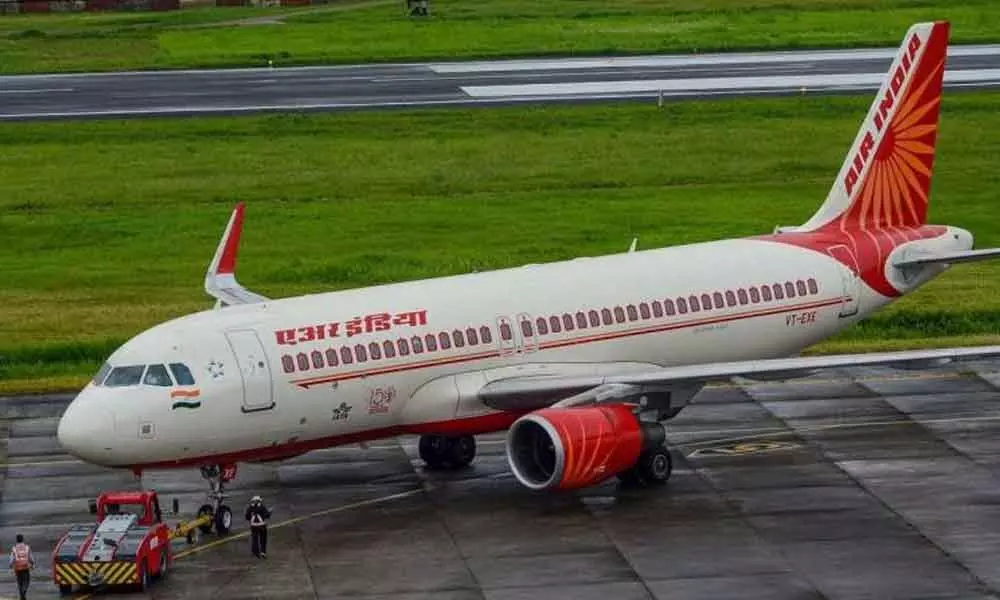 Group of 209 employees to bid for Air India
