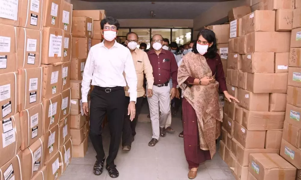 District Collector D Muralidhar Reddy inspecting District Central Drug Store along with Joint Collector Keerthi Chekuri in Kakinada on Friday