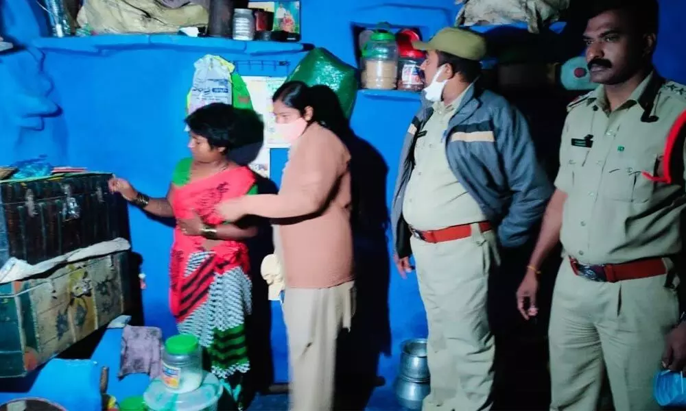 Allagadda DSP Rajendra and other police personnel conducting the searches at Kampamalla village under Kovelakuntla police station limits on Friday