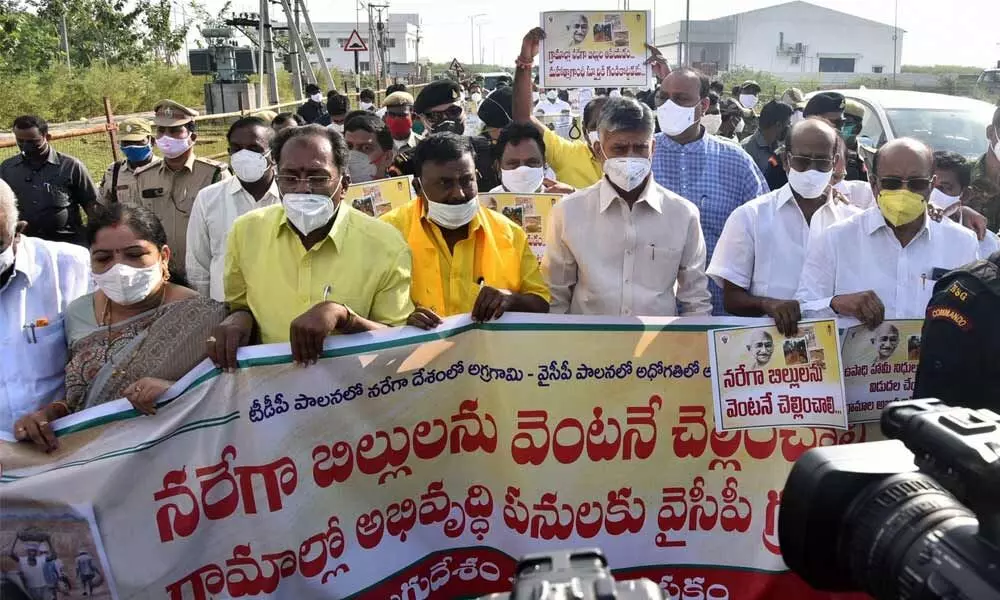 Opposition leader N Chandrababu Naidu along with his party legislators taking part in a protest rally to Assembly on Friday