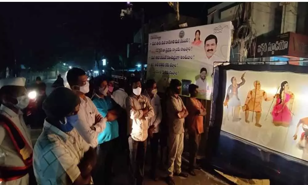 People watching puppet show in Kakinada on Friday