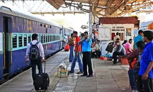 A train passing through road-cum-rail bridge on River Godavari