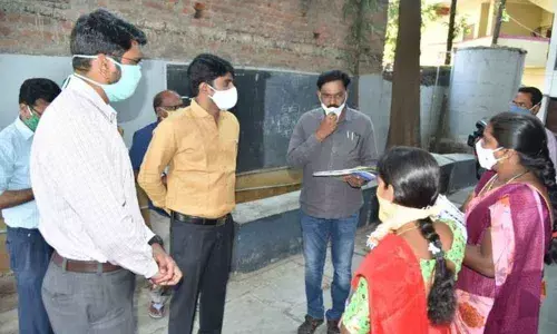 District Collector C Narayana Reddy examining special voter registration in Nizamabad on Saturday