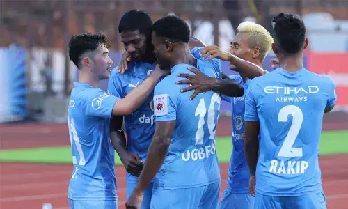 Mumbai City FC celebrate their  win over Odisha FC in a Hero ISL7 match at the Bambolim Stadium on Sunday