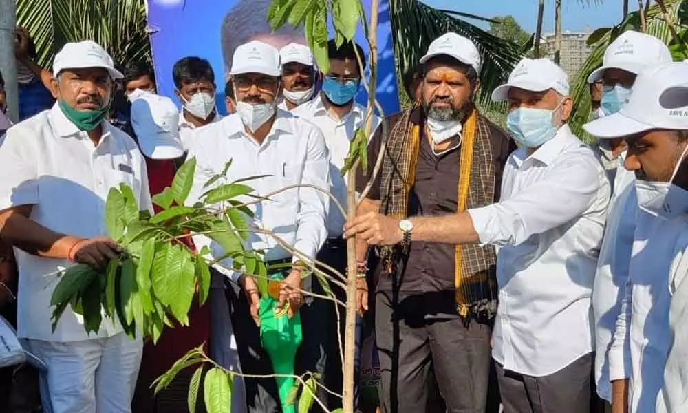 Tourism Minister Muttamsetti Srinivasa Rao and Rajya Sabha MP V Vijayasai Reddy at the saplings plantation drive in Visakhapatnam on Monday