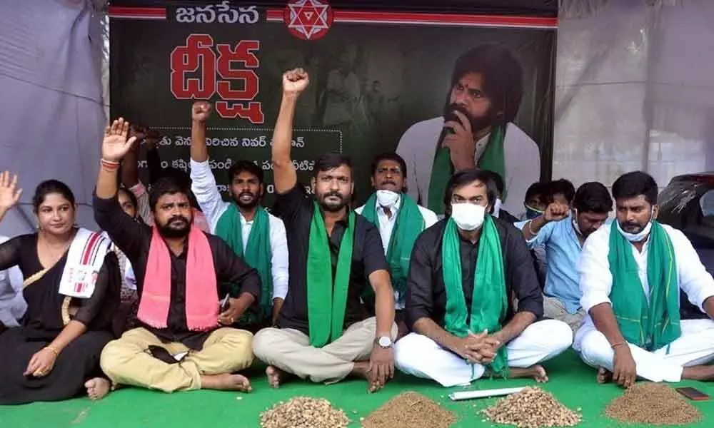 Jana Sena leaders staging protest in front of the Collectorate in Nellore on Monday