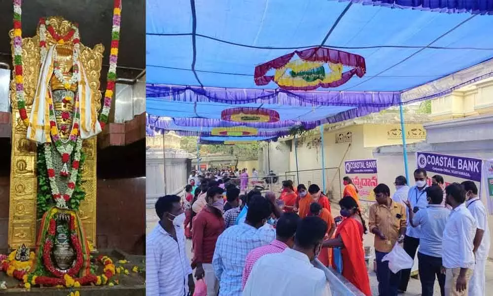 Devotees forming long queues at Amaralingeswara Swamy temple in Amaravati on Monday