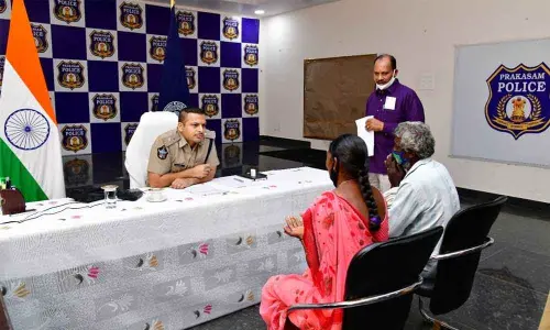 SP Siddharth Kaushal interacting with petitioners at Spandana programme in his office in Ongole on Monday