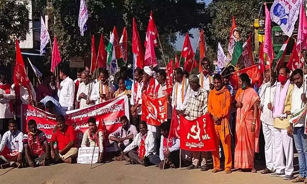 Left Parties stage protest at bus station centre in Mahabubabad on Tuesday.