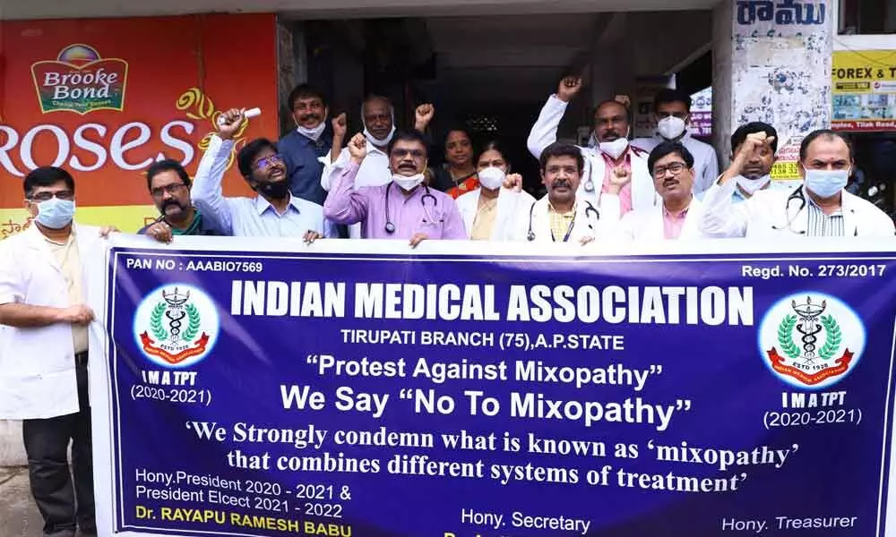Indian Medical Association members protest against Centre allowing Ayurveda doctors to perform surgueries, in Tirupati on Tuesday