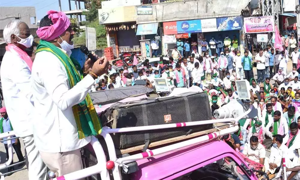 Minister for Panchayat Raj Errabelli Dayakar Rao addressing the cadres at Madikonda near Warangal on Tuesday