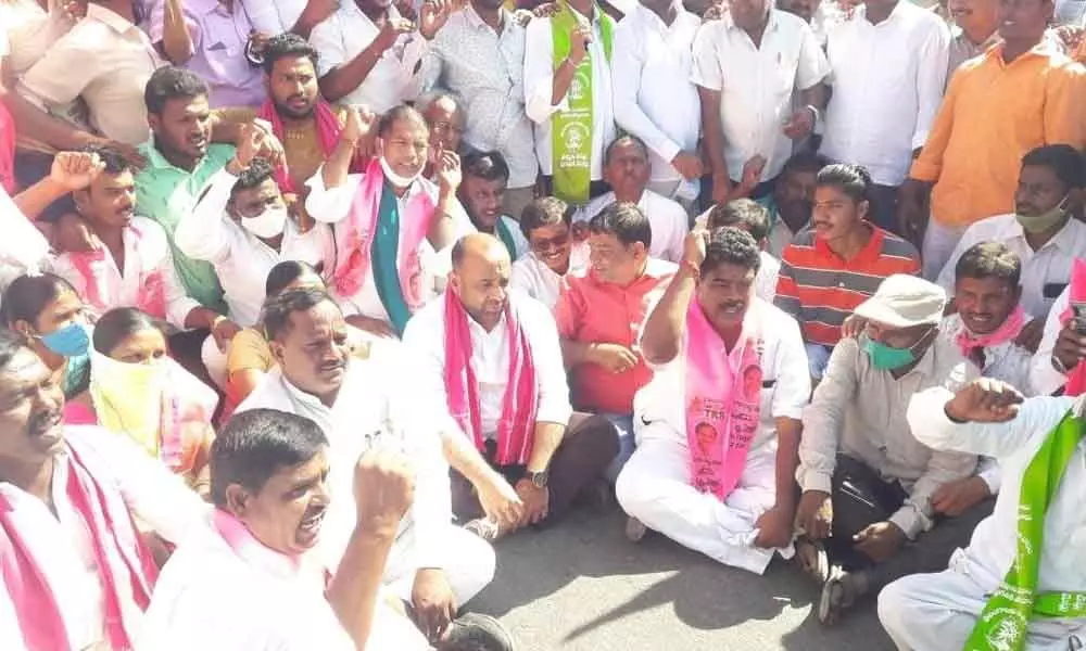 MLA Mohammed Shakeel Amer staging a dharna in Narsapur on Tuesday
