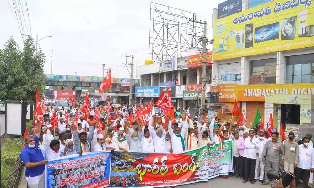 Members of farmers associations, trade unions, political parties, supporters of farmers participating in a rally as part of Bharat Bandh in Ongole on Tuesday