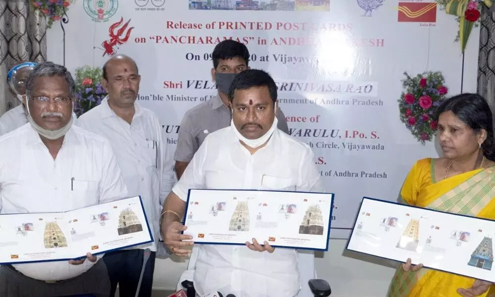 Endowments Minister Velampalli Srinivasa Rao and Chief Postmaster General Dr Mutyala Venkateswarulu releasing  Pancharamam post cards in Vijayawada on Wednesday