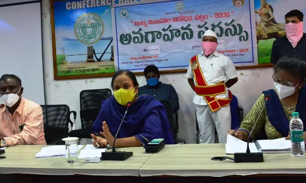 Rural District Collector M Haritha speaking at an awareness programme that focused on the Prohibition of Child Marriage Act, 2006, in Warangal on Wednesday