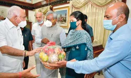 CM B S Yeddyurappa being invited by Mysuru district minister S T Somashekar and Mysuru Deputy Commissioner Rohini Sindhuri for Panchalinga Darshana recently.