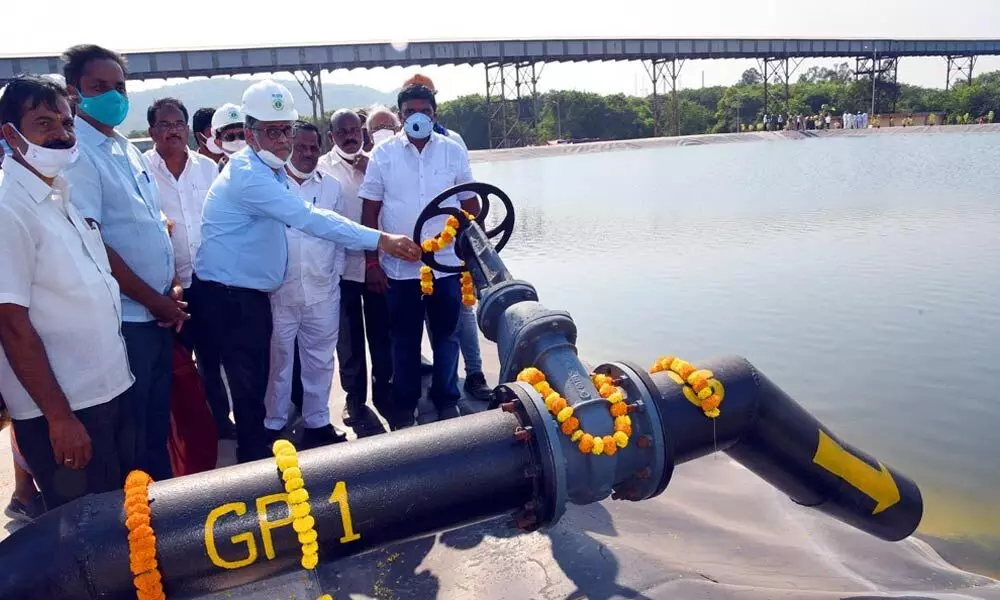 RINL CMD P K Rath inaugurating the guard pond at VSP in Visakhapatnam on Thursday