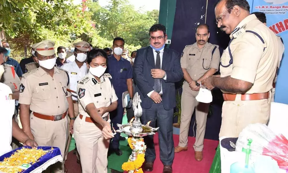 District Judge Justice G Gopi inaugurating the Police Duty Meet by lighting a lamp in Vizianagaram on Thursday. DIG L K V Ranga Rao and SP B Rajakumari are also seen