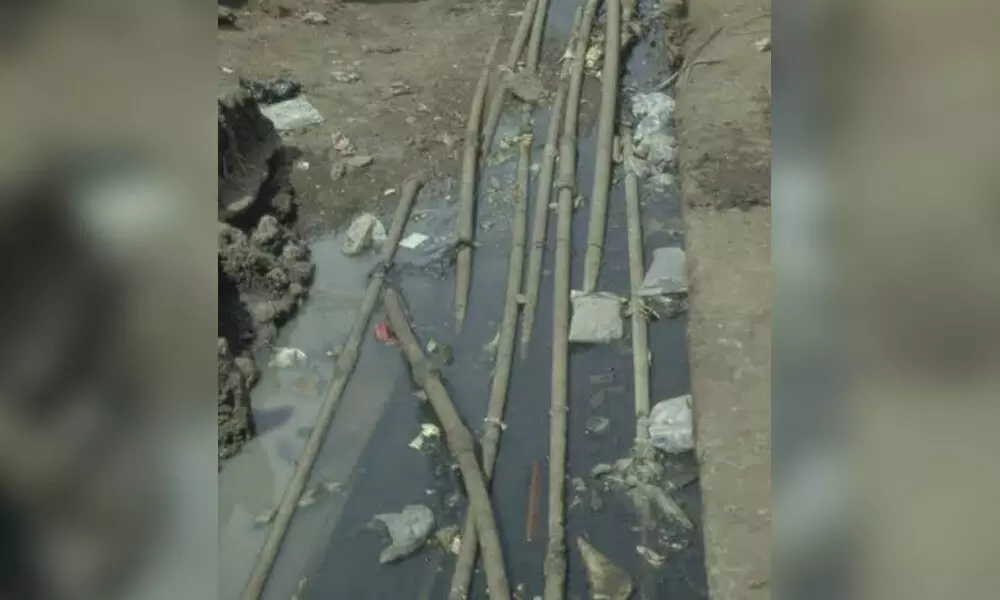 Drinking water pipelines passing through drains in Anantapur