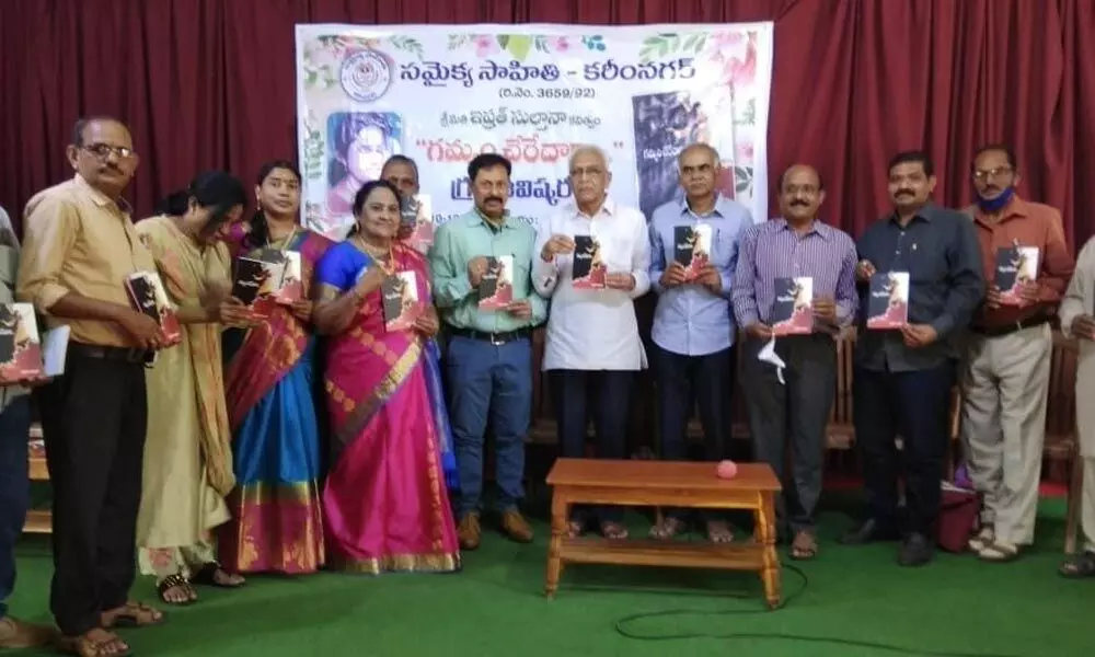 Famous poet Nandini Siddha Reddy releasing the book