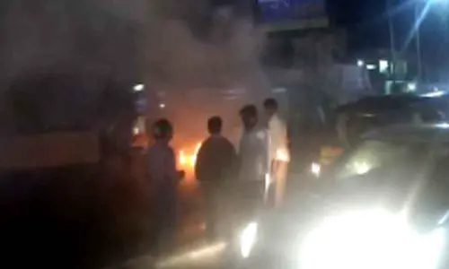 Car catches fire at NAD junction in Visakhapatnam