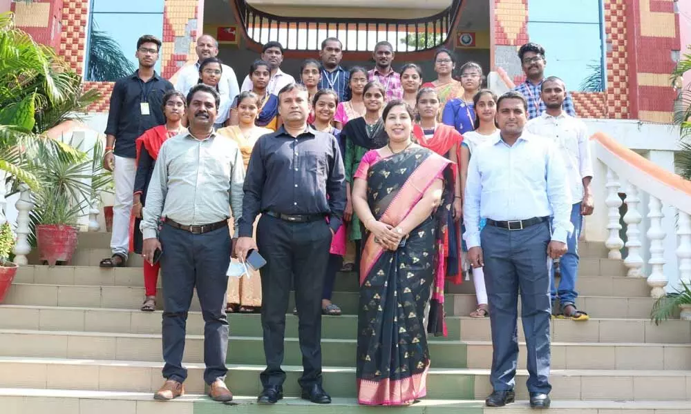 Secretary of PACE Institute of Technology and Sciences Maddisetti Sridhar, Principal  Dr M Srinivasan and Placement head K Roopa with the students who secured placement in Infosys