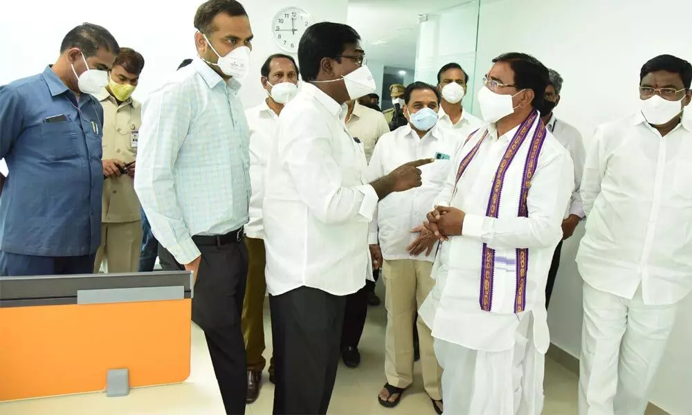 Ministers S Niranjan Reddy and P Ajay Kumar inspecting IT Hub in Khammam on Sunday