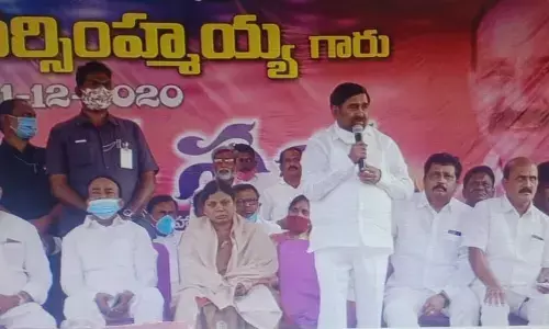 Minister G Jagadish Reddy addressing the gathering at a memorail meeting of later Nomula Narasimhaiah at Halia on Sunday