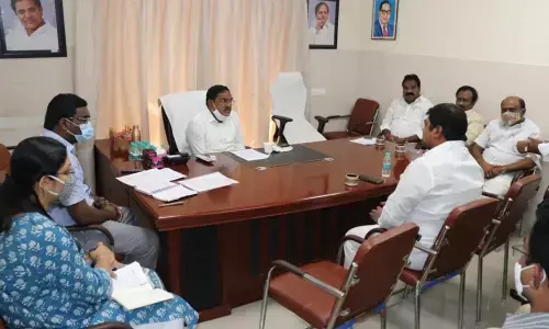 Minister for Panchayat Raj Errabelli Dayakar Rao conducting a review meeting in Warangal on Sunday