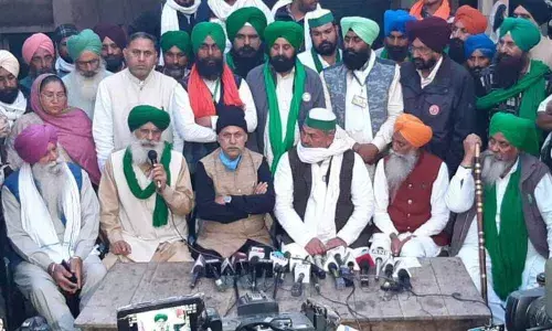 Farmer leaders addressing the media at the Singhu border on Sunday