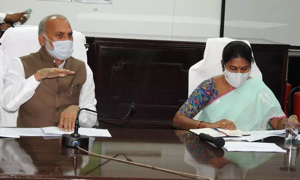 Rajya Sabha Member Alla Ayodhya Rami Reddy conducting a review meeting in Guntur on Monday. GMC Commissioner Challa Anuradha also seen