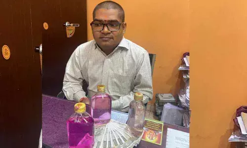 A Tukaram was caught redhanded by ACB while accepting a cash amount of Rs.8000/- at Jedimetla electricity office .