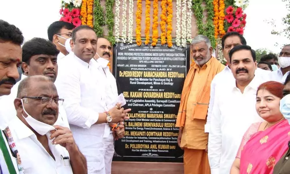 Cap: Deputy Chief Minister K Narayana Swamy, Ministers Goutham Reddy, Srinivasa Reddy, MLA K Govardhan Reddy and others laying foundation stone for a water scheme in Venkatachalam mandal on Wednesday