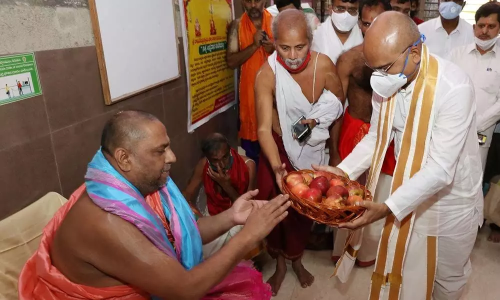 TTD EO Dr K S Jawahar Reddy presenting prasadam to Sri Subudendra Theertha Swamiji in Tirumala on Wednesday